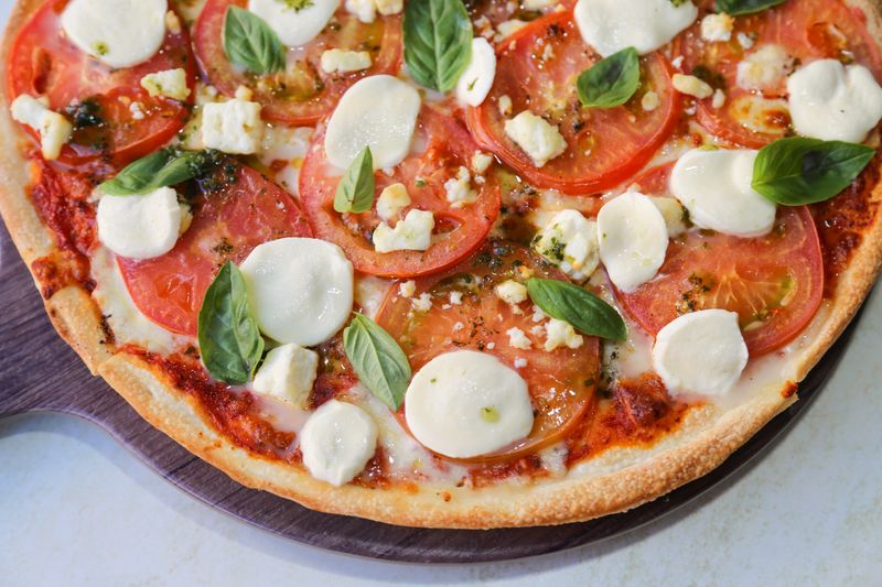 pizza luce Margherita — classic tomato and mozzarella pizza